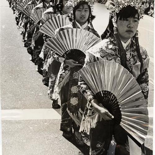 [St. Mary's Chinese Girls Drum Corps marching in the Columbus Day Parade]