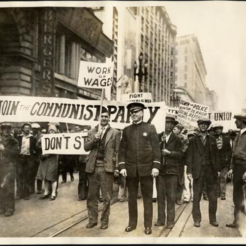 [Communist Party parade and Chief William J. Quinn on Market Street]