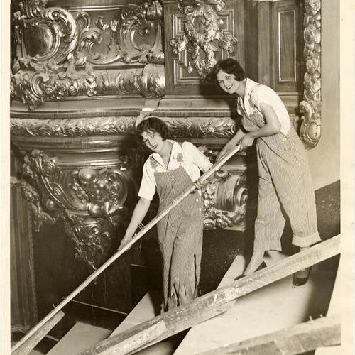 [Dorothy and Olga pose inside the Fox theater during its construction]