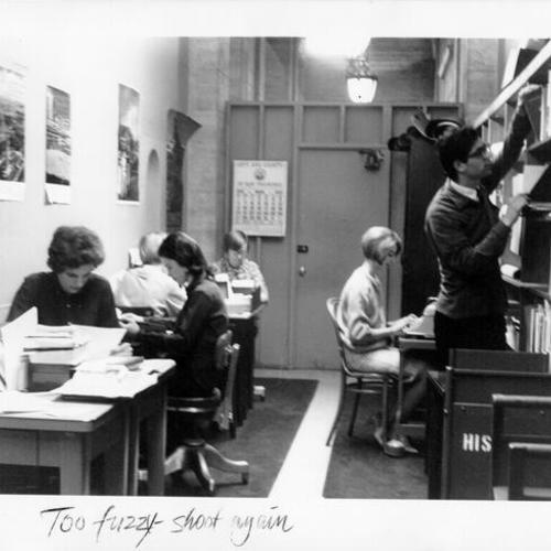[History Department staff in Main Library office]