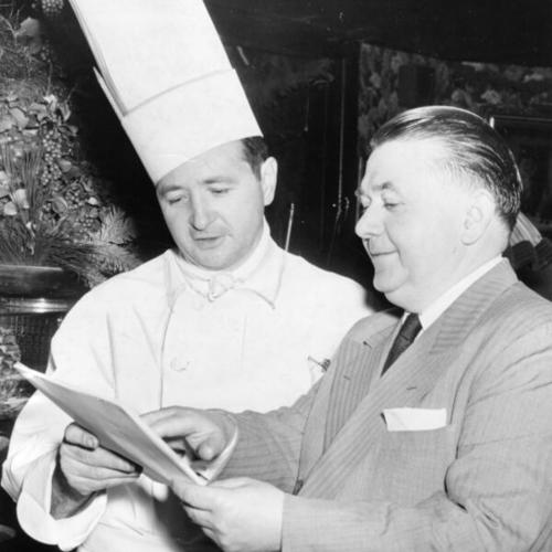 [John Rickey preparing the daily menu with chef Fred Eberhardt at Rickey's Town House restaurant]
