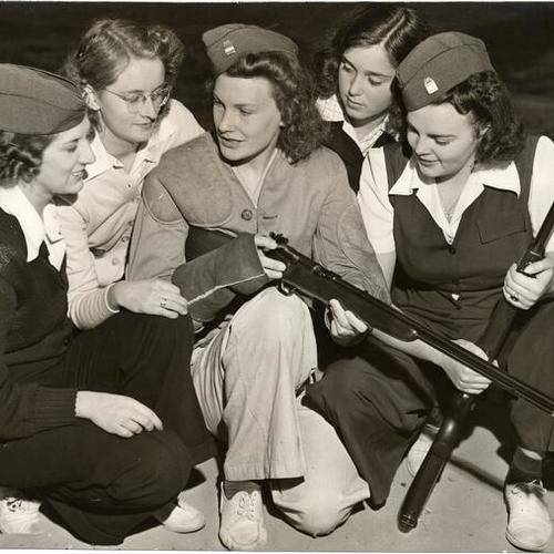 [Lucille Rombaugh, Virginia Martin, Marie Beyers, Barbara Malloy, Lorraine Jenevein at the American Women's Voluntary Services (AWVS) rifle class]