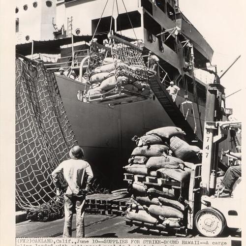 [Navy cargo ship "Chara" is loaded with supplies]