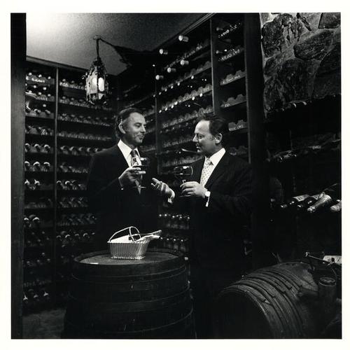 [Roland and Victor Gotti, co-owners of Ernie's Restaurant, in the restaurant's wine cellar]