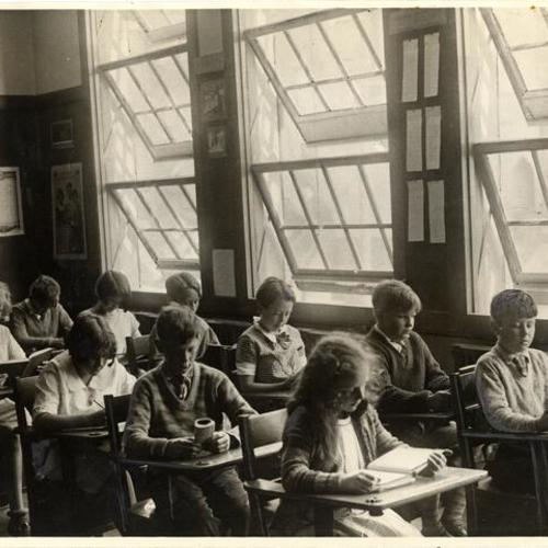 [Students seated in classroom at Dudley Stone School]