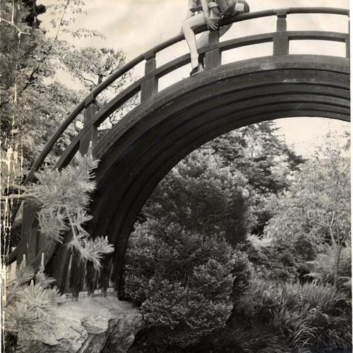 [Dianne Shinn poses on bridge in the Japanese Tea Garden]