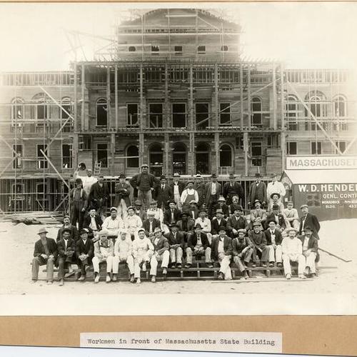 Workmen in front of Massachusetts State Building