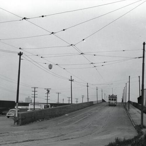 [South end of Third street viaduct looking north at northbound #16 line car climbing ramp]