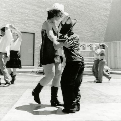 [Couple dancing at Gay Pride Parade at the Country Western stage, Civic Center]