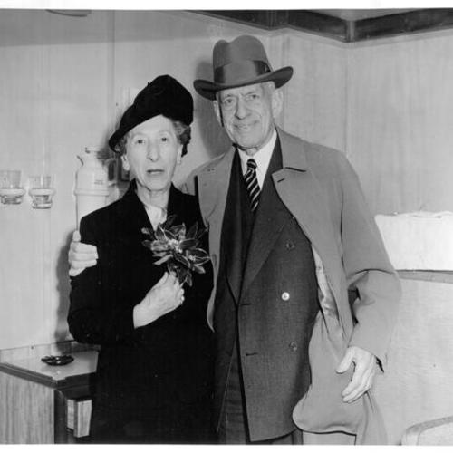 [Mr. and Mrs. Mortimer Fleishhacker posing for a picture before leaving for a Mediterranean cruise]