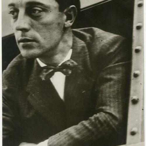 Buster Keaton leaning through window