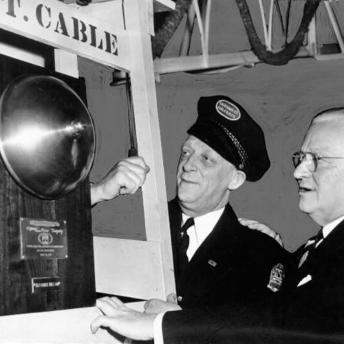 [Mayor Elmer Robinson with the champion cable car bell ringer of San Francisco]