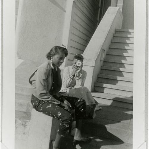 [Doris and friend Virginia with new Brownie camera in 1957]