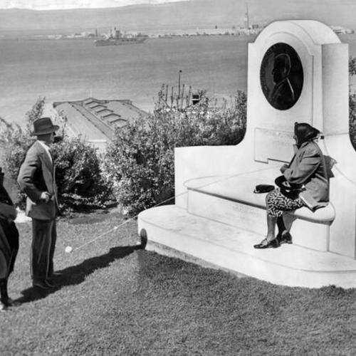 [Rita Barbetta and two unidentified people visiting monument dedicated to Guglielmo Marconi]
