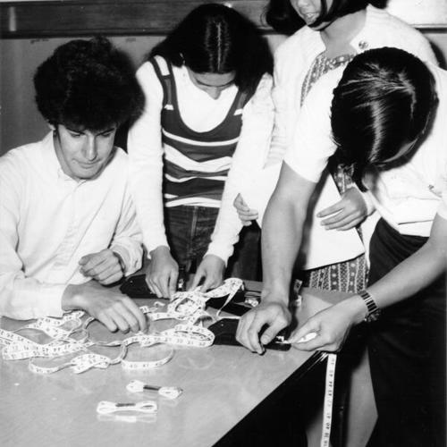 [Four students working on a project at Presidio Junior High School]
