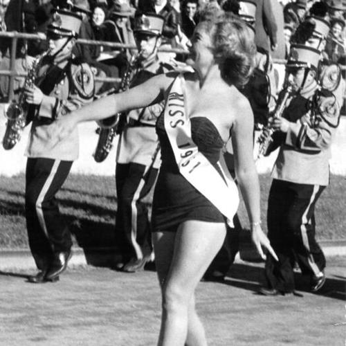 [Lois Kirchner, "Miss 1951," entertaining crowd at East-West Shrine game at Kezar Stadium]