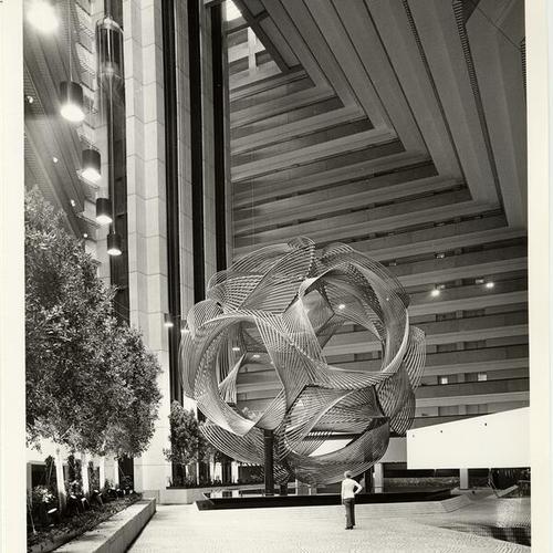 [Charles Perry sculpture, "Eclipse," in the atrium-lobby of the Hyatt Regency Hotel]