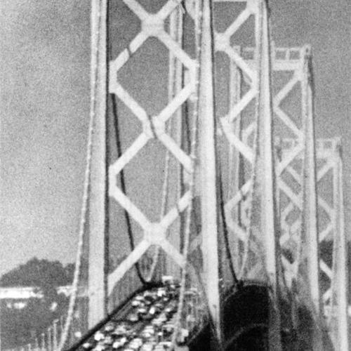 [Telephoto view of four suspension towers of Bay Bridge]