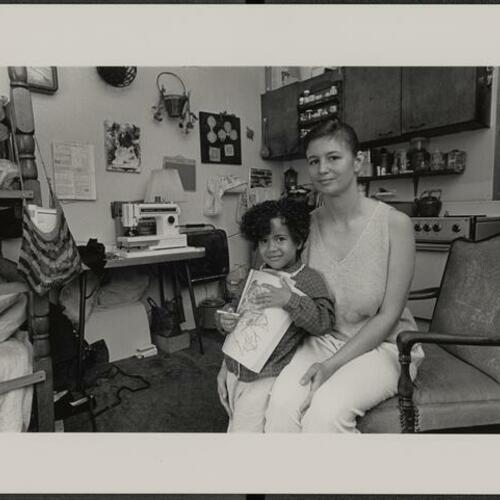 Tenderloin resident Dana Lasha and her child Hannah Lasha in their apartment