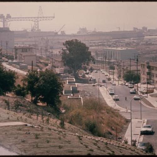 View of hillside and street leading towards Hunters Point Naval Shipyard