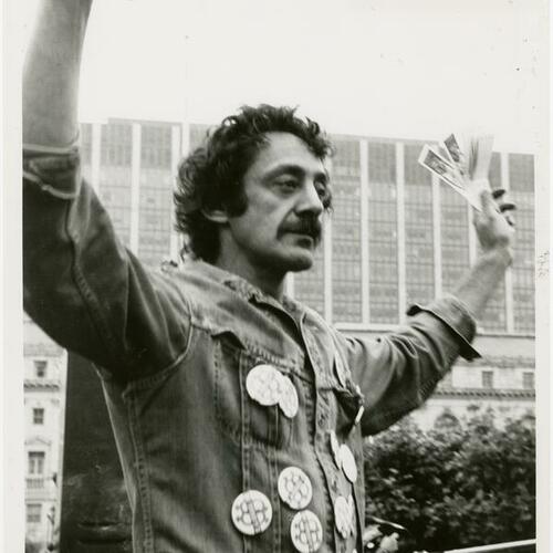 [Harvey Milk on stage at Gay Day in the Civic Center]
