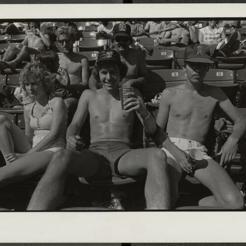 Spectators sunning at Giants game in Candlestick Park