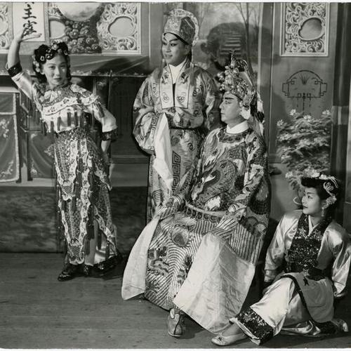 [Members of the Chung Mei Theatrical Group during a performance]