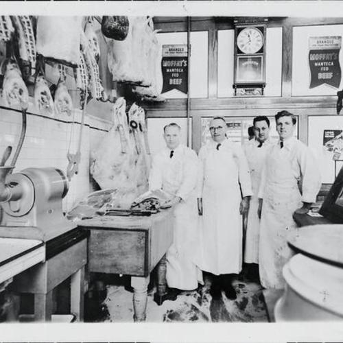 [Owners and employees of The Stadium Market on Irving Street in 1935]
