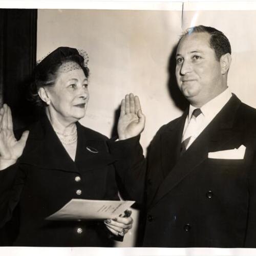[William C. Blake being sworn in as Supervisor by Theresa Meikle]
