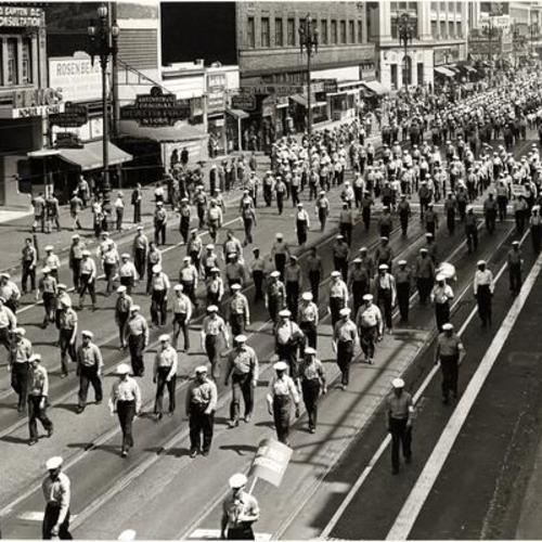 [C.I.O. Marchers parading down Market Street on Labor Day]