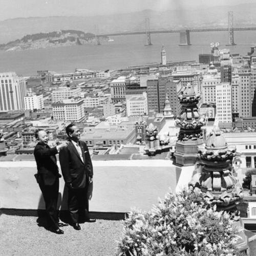 [Philippine ambassador Carlos Romulo and Philippine president Carlos Garcia on the roof of the Mark Hopkins Hotel]