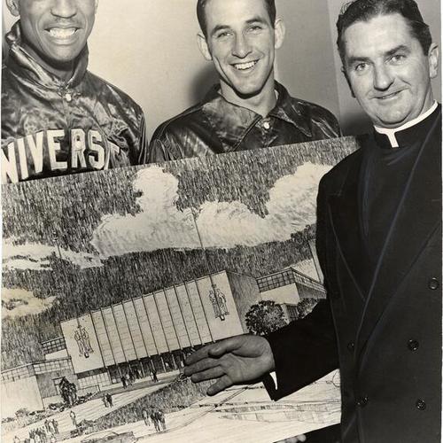 [University of San Francisco basketball players Bill Russell and Jerry Mullen holding an architect's drawing of proposed new gymnasium]