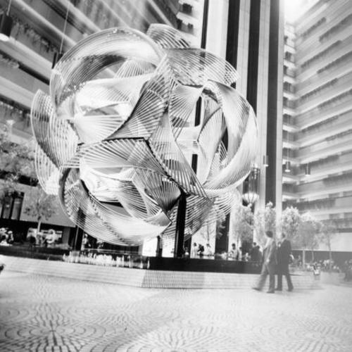 [Charles Perry sculpture, "Eclipse," in the atrium-lobby of the Hyatt Regency Hotel]