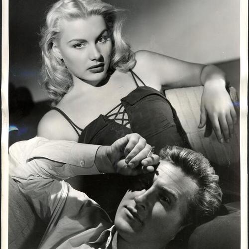 [Publicity still of Barbara Payton and Lloyd Bridges for motion picture "Trapped"]
