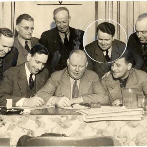 [Pacific Coast Teamsters' strategy committee. Seated: C.W. Real, Oakland; Dave Beck, chairman, Seattle; F.W. Brewster, Seattle. Standing, John P. McLaughlin, San Francisco; H.W. Dail, Los Angeles; Jack Carter, Oakland; Joseph Casey, San Francisco, and A.E