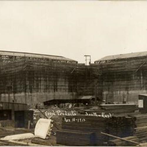[View of the southeast corner of the Palace of Food Products under construction, Panama-Pacific International Exposition]