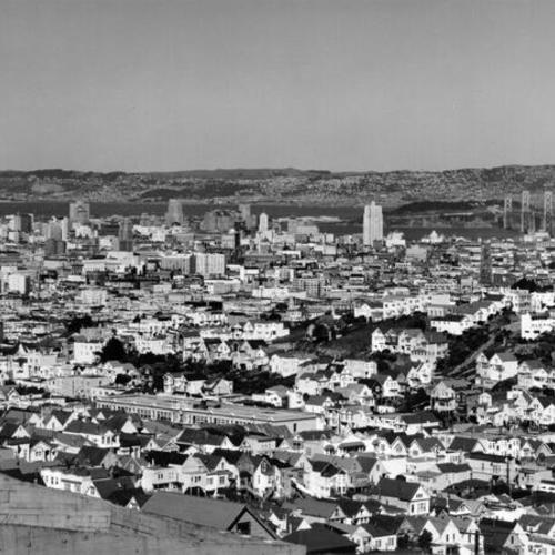 [View of San Francisco, looking east, showing Bay Bridge and East Bay in distance]