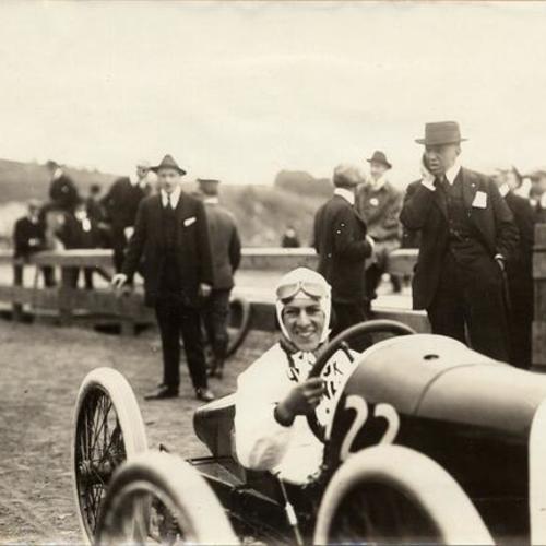 [Ralph De Palma driving a Mercedes racing car at the Panama-Pacific International Exposition]