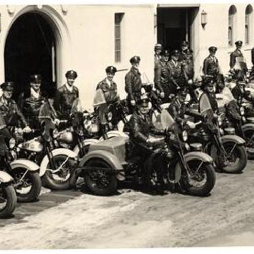 [San Francisco motorcycle cops in front of new Southern Station]