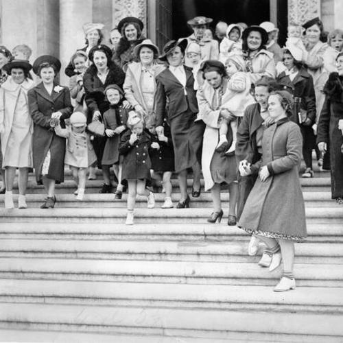 [Women and children on the steps of St. Anne's Church during novena to St. Anne]