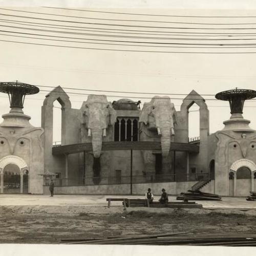 [Front view of Scenic Railway building during construction in The Zone at the Panama-Pacific International Exposition]