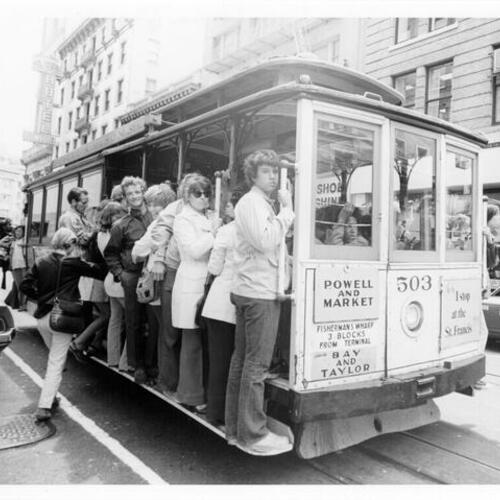 [Passengers boarding Powell Street cable car]