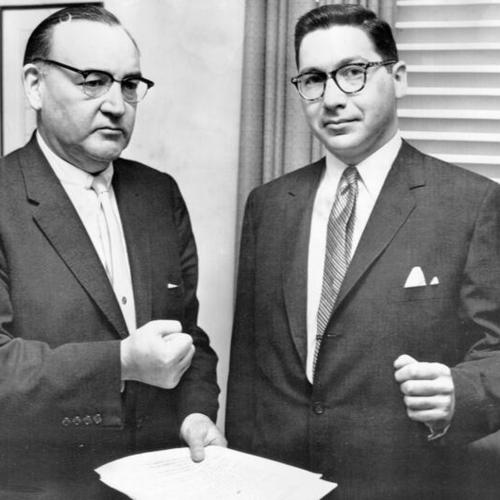 [Attorney General Edmund Brown (left) and Attorney Alvin Goldstein Jr. at a news conference]