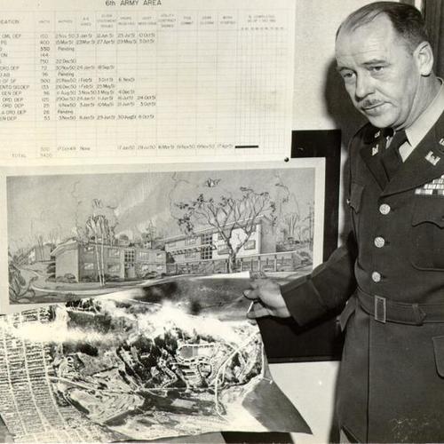 [Colonel A. A. G. Kirchhoff, 6th Army engineer, shown with plans for a Presidio housing project]