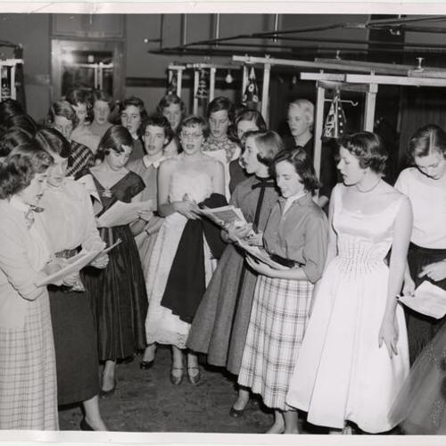 [Students of Katherine Delmar Burke School for girls singing Christmas carols at Letterman Army Hospital]
