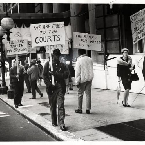 [Pickets outside the St. Francis Hotel]
