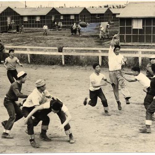 [Game of touch football being played in Japanese internment camp]