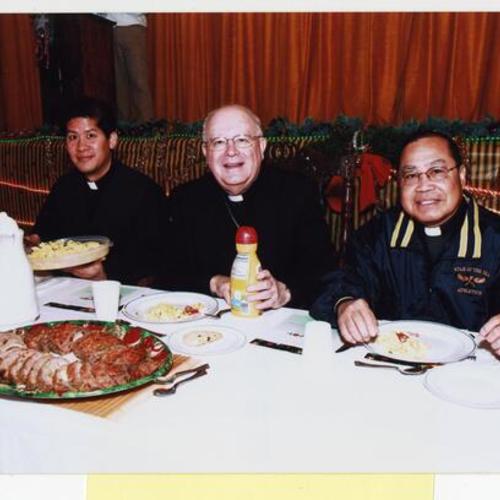 [Father Ricky, Archbishop George, Monsignor Floro at St. Stephen Church the post simbang gabi reception]
