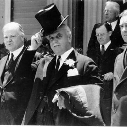 [San Francisco Mayor Rossi, former President Herbert Hoover, California Governor James Rolph and Nevada Governor Balzar leave for Bay Bridge groundbreaking ceremony]