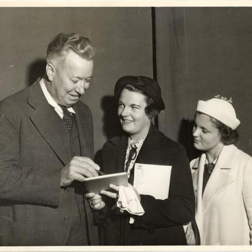 [Superindendent Edwin A. Lee and unidentified persons at San Francisco Junior College opening]
